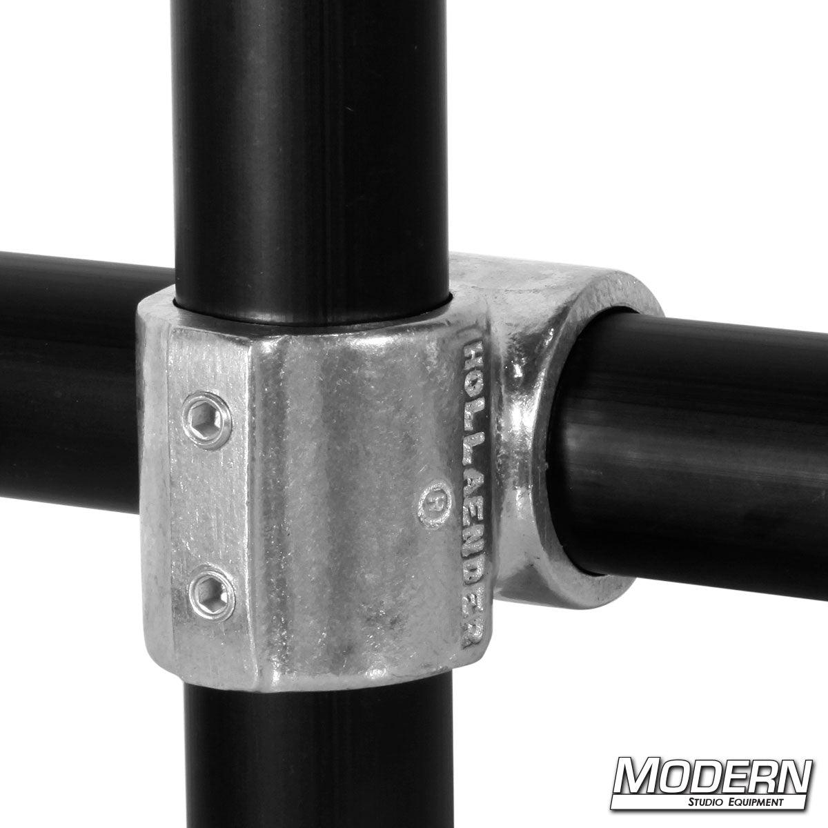 Side view of Hollaender® Fitting Short Barrel Cross — durable cast aluminum connector for 90-degree Speed-Rail® pipe intersections | Modern Studio Equipment