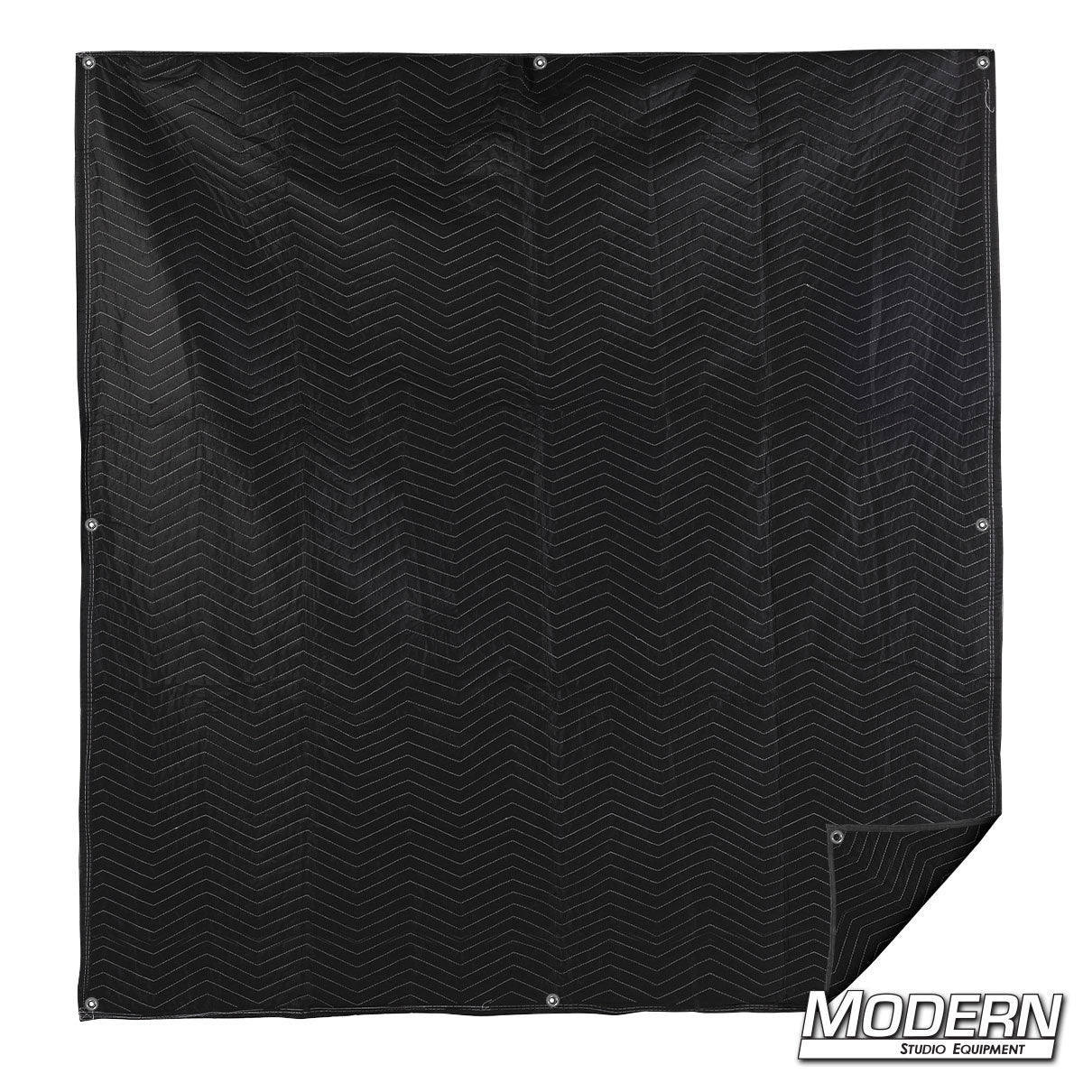 Black furniture blanket with grommets for film production equipment protection and studio applications