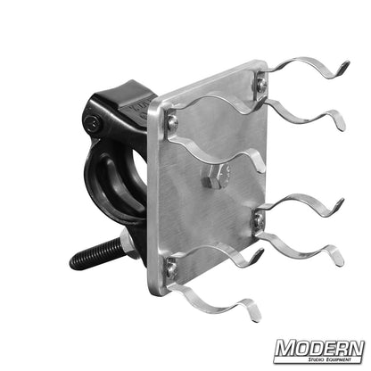 Dual T12 fluorescent lamp holders with integrated grid clamp for mounting fluorescent tubes in film, television, and studio lighting applications