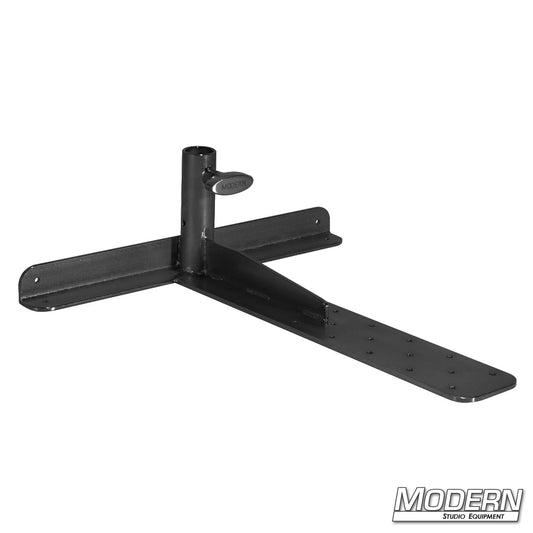 A black heavy gauge steel T-Bone Junior grip equipment piece used in film sets for mounting light fixtures.
