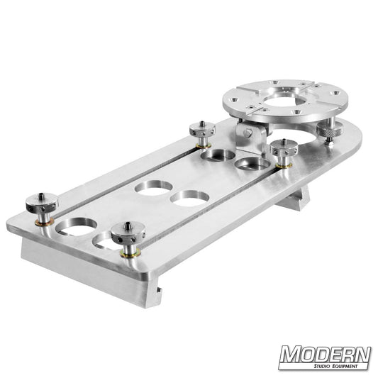 A silver-colored metal step ladder mitchell mount used for extending camera out 24 inches.