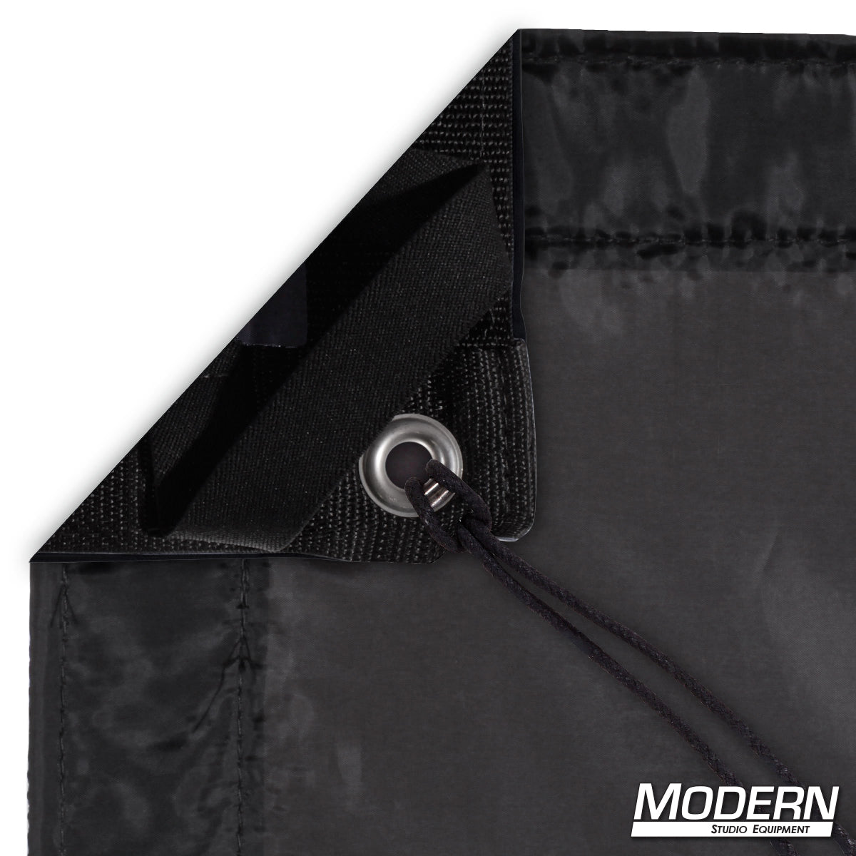 Black Artificial Silk diffusion fabric for soft, controlled lighting in professional film, television, and photography production setups.