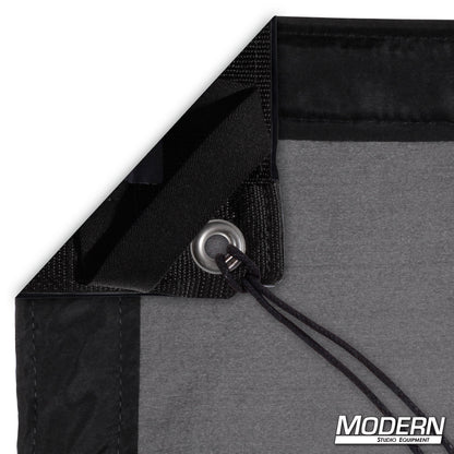 Black China Silk diffusion fabric for soft, even lighting control in professional film, television, and photography production setups.