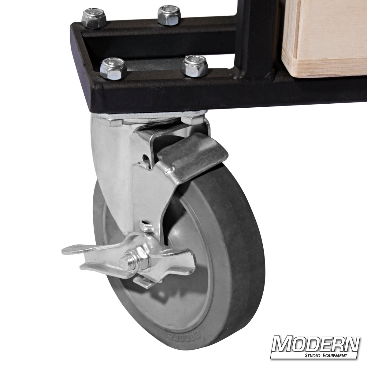 Close-up of wheels and parking brake on grip cart