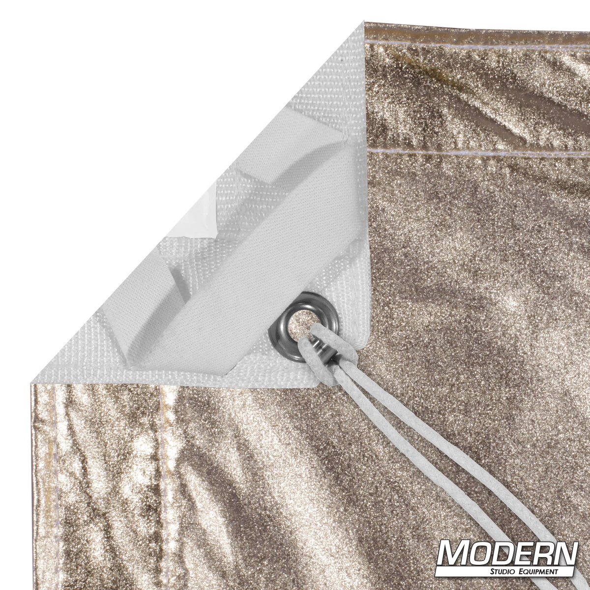 Gold White Lame reflective bounce fabric mounted on frame with warm gold reflective surface for film production, photography, portrait lighting, interviews, and studio lighting control