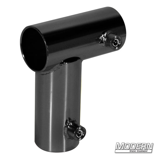 A black metal mini corner fitting used for creating a 90-degree corner on a frame, designed for 1-1/4 inch Schedule 40 aluminum Speed-Rail.