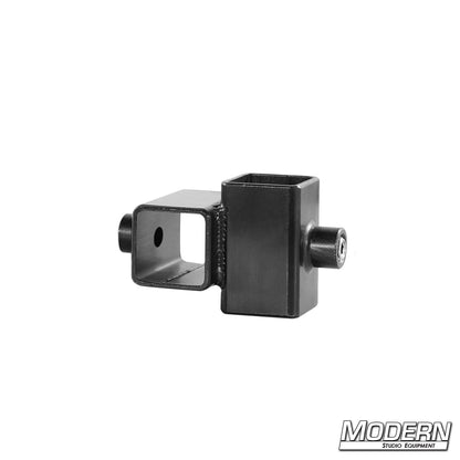 A black metal mini cross fitting for 1 inch square tube, displayed on a white background with the brand 'Modern Studio Equipment' visible.