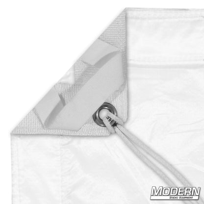 Silent 1/2 Grid Cloth lighting diffusion textile with webbing, grommets, ties, and elastic corners for film and studio lighting